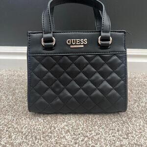 Black quilted mini handbag by